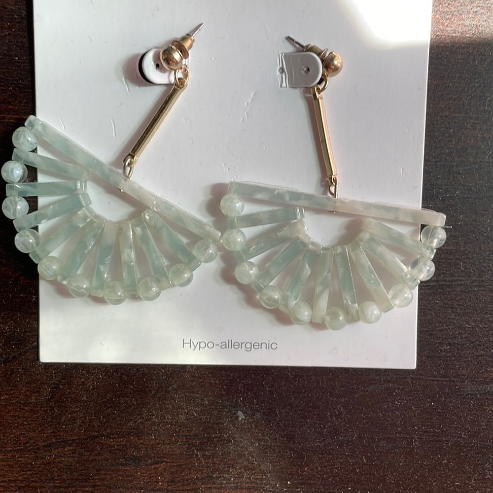 Dangly teal earring